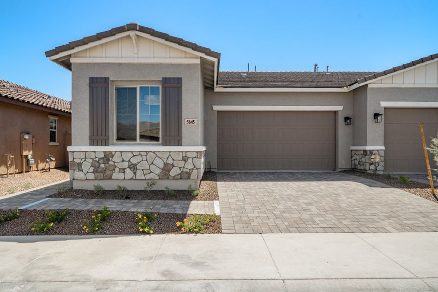 Representative exterior photo of a completed home built from the Brisa by Risewell Homes in Mira Vista at Victory, Buckeye, AZ (Image 5).