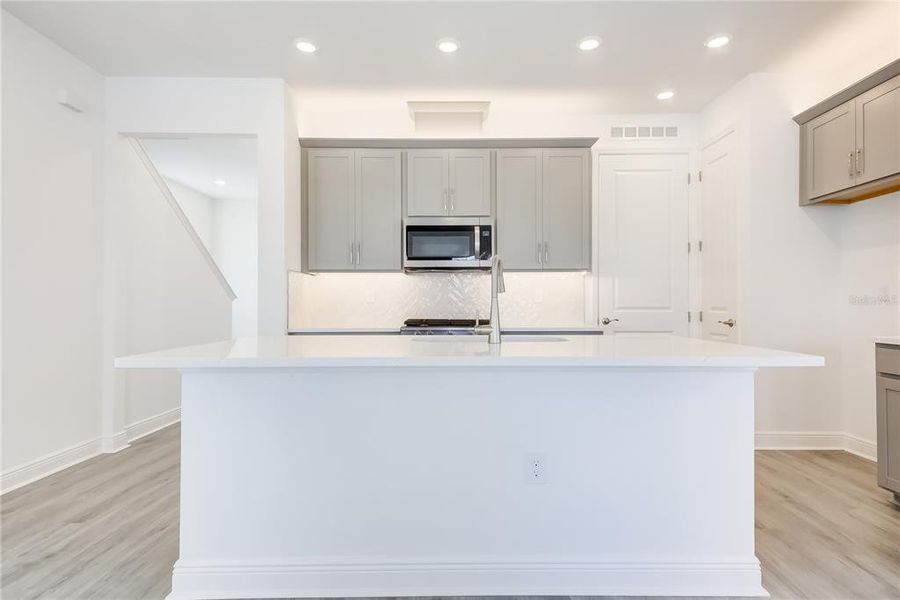 Furnished interior view inside a new home in Bungalow Walk at Lakewood Ranch, Sarasota (Image 6).