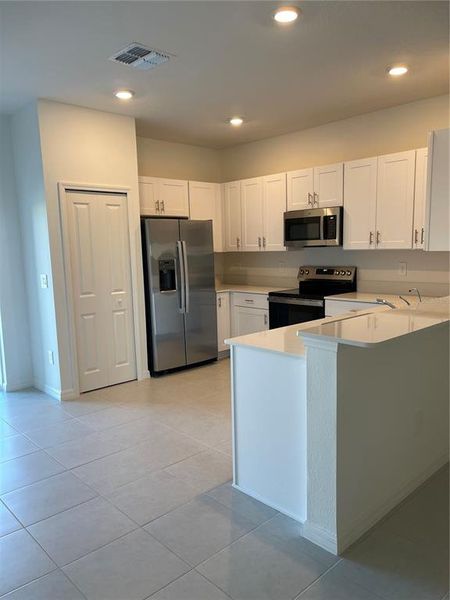 Furnished interior view inside a new home in , Zephyrhills (Image 4). Furnished interior view inside a new home in , Zephyrhills (Image 4).