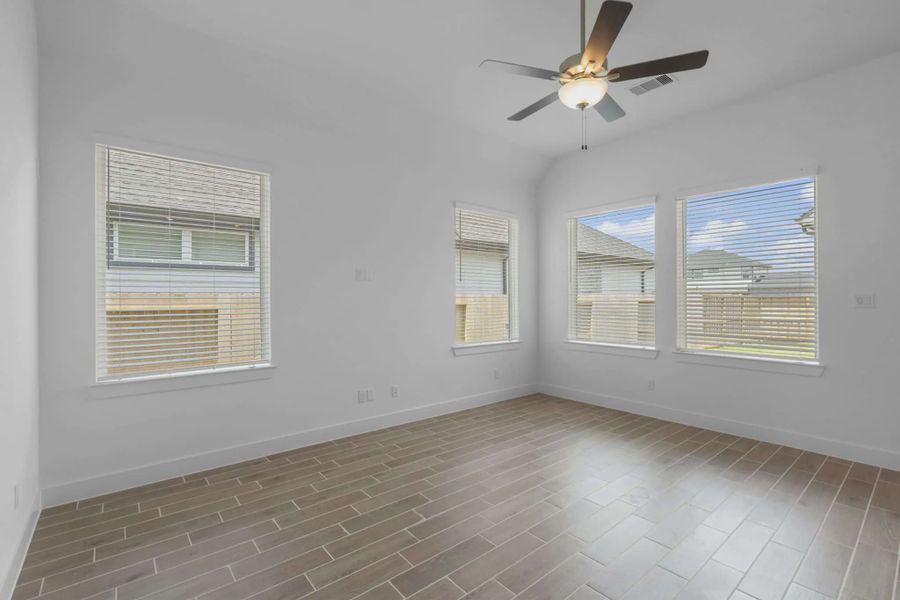 Representative unfurnished interior of a home built from the Mickelson by Chesmar Homes in Riceland Alley Loads, Mont Belvieu (Image 77).