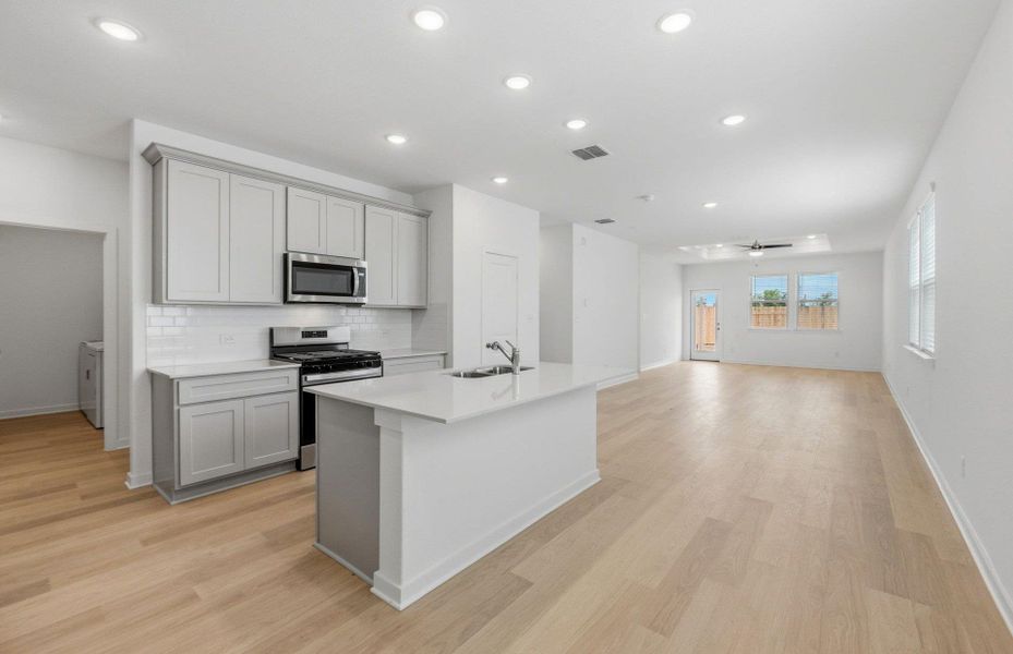 Furnished interior view inside a new home in Sunfield, Buda (Image 9).