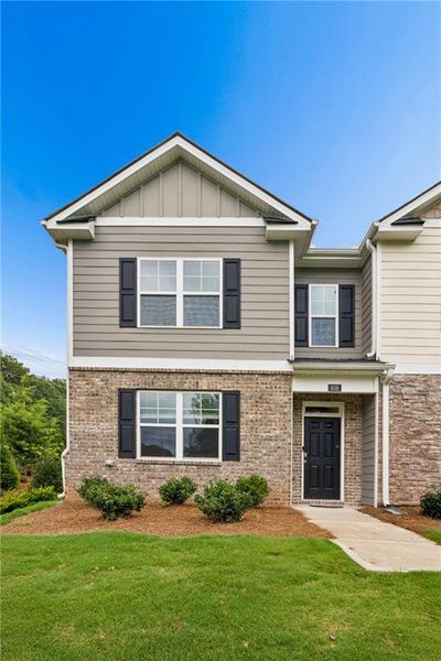 Front exterior of a new home in , Lawrenceville, GA, highlighting curb appeal (Image 24). Front exterior of a new home in , Lawrenceville, GA, highlighting curb appeal (Image 24).