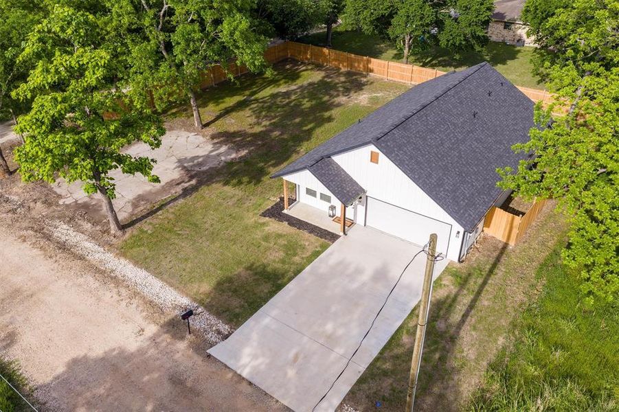 Front exterior of a new home in , Cooper, TX, highlighting curb appeal (Image 21).