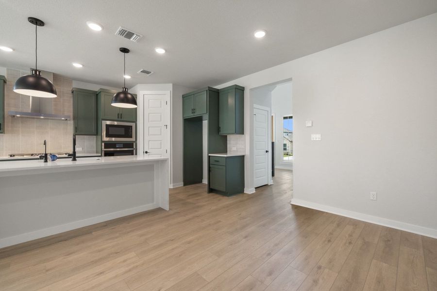 Furnished interior view inside a new home in Heritage, Dripping Springs (Image 14).
