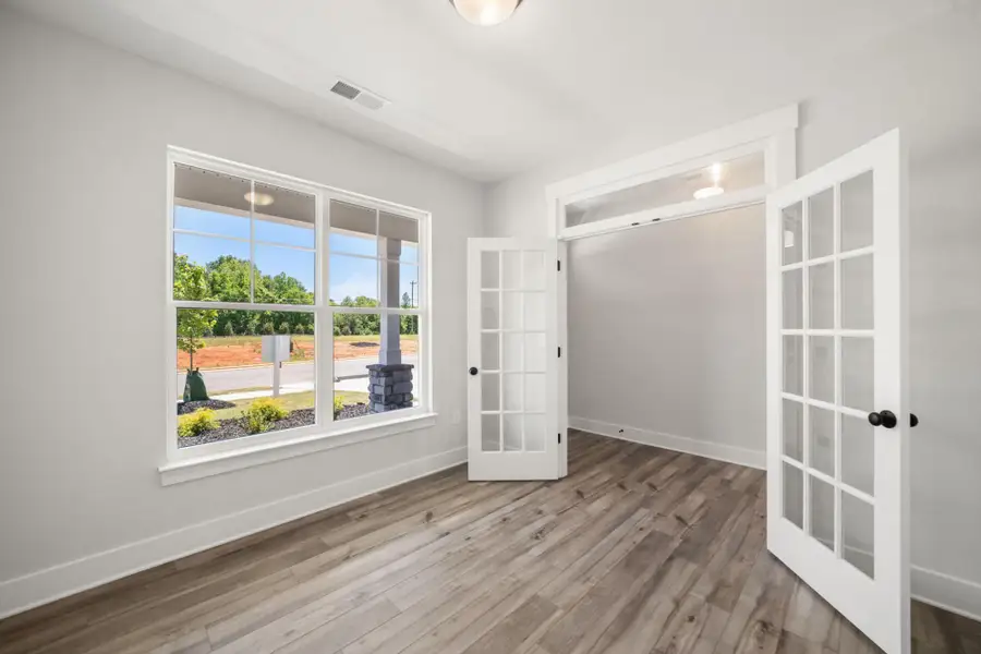 Spacious, unfurnished interior of a new home in Hayes Village, Greensboro (Image 12).