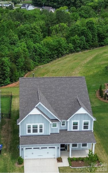 Front exterior of a new home in Summerlin, Mooresville, NC, highlighting curb appeal (Image 28).