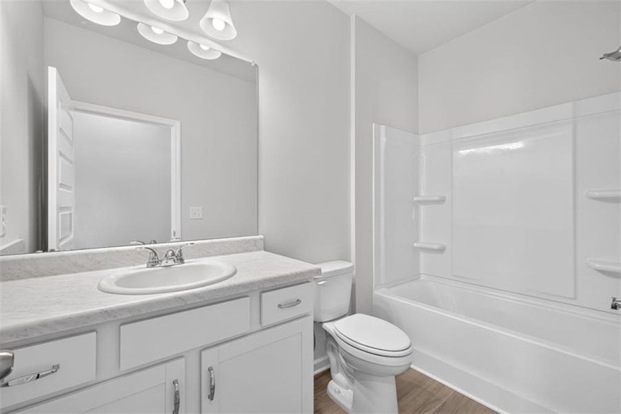 Furnished interior view inside a new home in Summerfield Place, Carrollton (Image 12).
