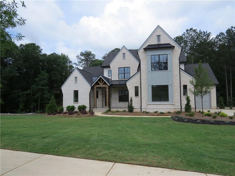 Front exterior of a new home in , Acworth, GA, highlighting curb appeal (Image 26).