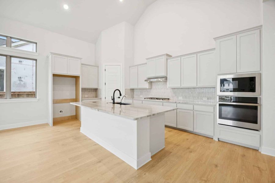 Furnished interior view inside a new home in The Grove Frisco, Frisco (Image 8).