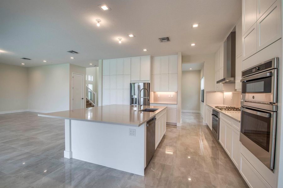 Furnished interior view inside a new home in Apex at Avenir, Palm Beach Gardens (Image 13).