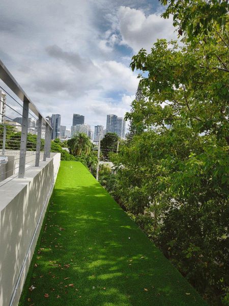 Exterior details and patio area of a home in , Miami (Image 3). Exterior details and patio area of a home in , Miami (Image 3).