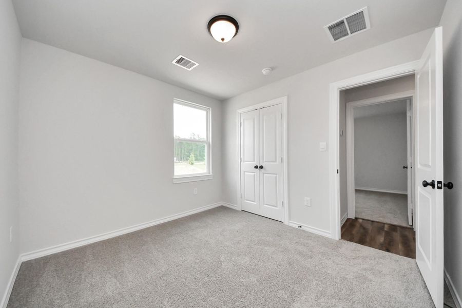 Spacious, unfurnished interior of a new home in The Enclave at Spring Branch, Conroe (Image 29). Spacious, unfurnished interior of a new home in The Enclave at Spring Branch, Conroe (Image 29).