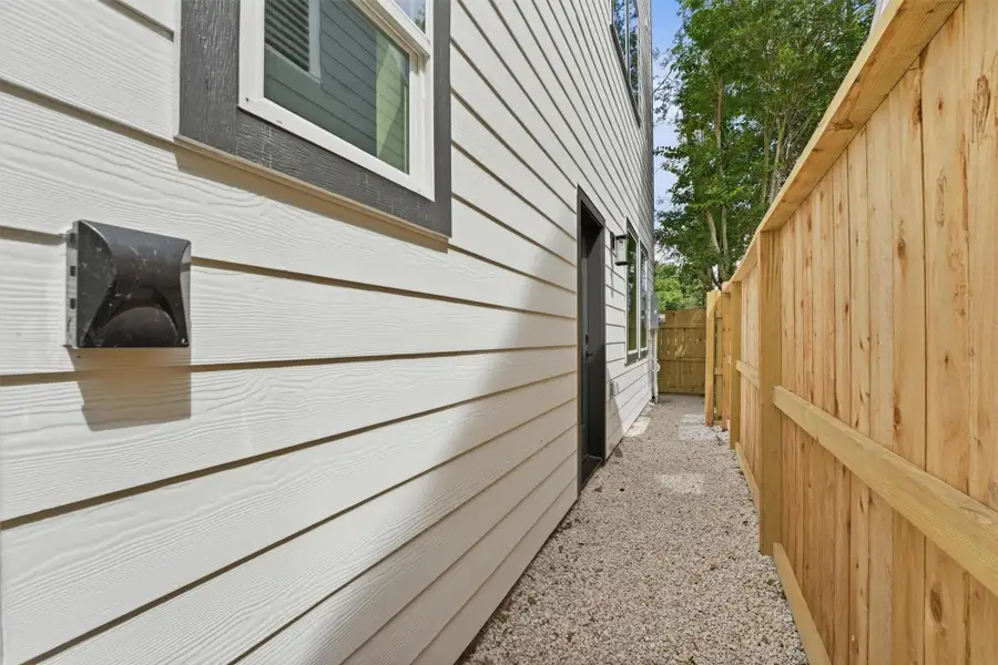 Exterior details and patio area of a home in , Houston (Image 3).