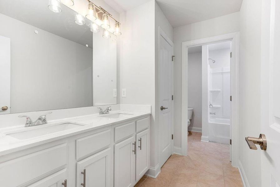 Furnished interior view inside a new home in Waters Edge, Mansfield (Image 6).