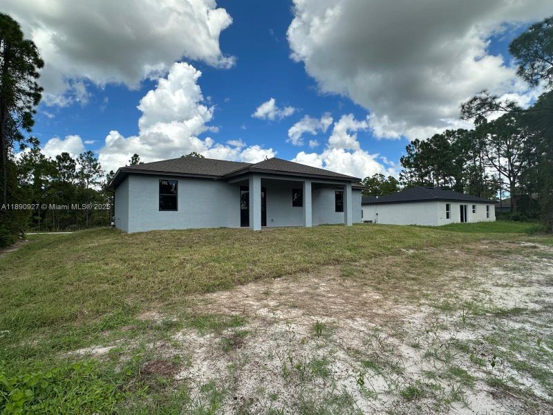 Exterior details and patio area of a home in , Lehigh Acres (Image 7).