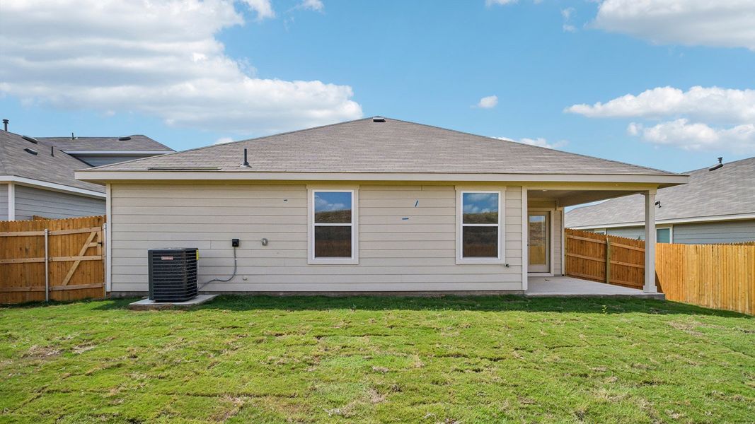 Exterior details and patio area of a home in Prairie Lakes, Buda (Image 18).