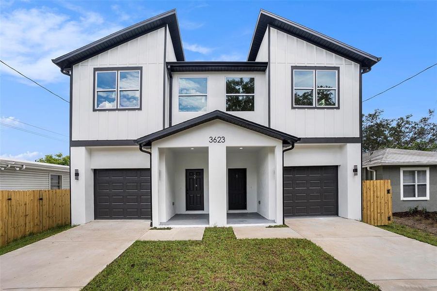 Front exterior of a new home in , Tampa, FL, highlighting curb appeal (Image 21).