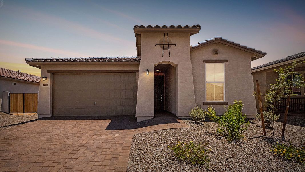 Spanish Colonial style Elevation A front twilight view of this quick move-in home by DRB Homes at Saguaro Hills at Vistancia. Spanish Colonial style Elevation A front twilight view of this quick move-in home by DRB Homes at Saguaro Hills at Vistancia.