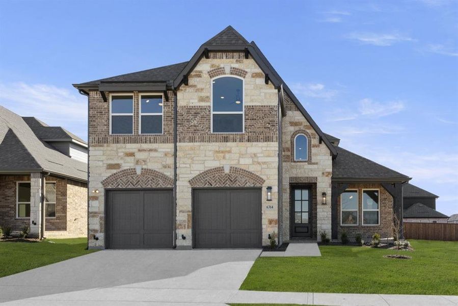 Front exterior of a new home in Edgewood Creek, Celina, TX, highlighting curb appeal (Image 2).