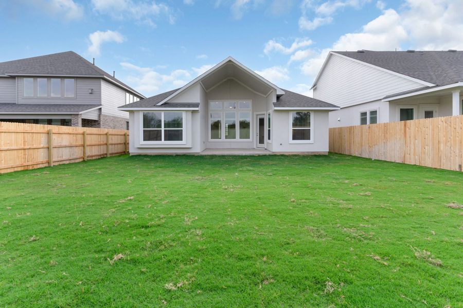 Exterior details and patio area of a home in Santa Rita Ranch, Liberty Hill (Image 3).