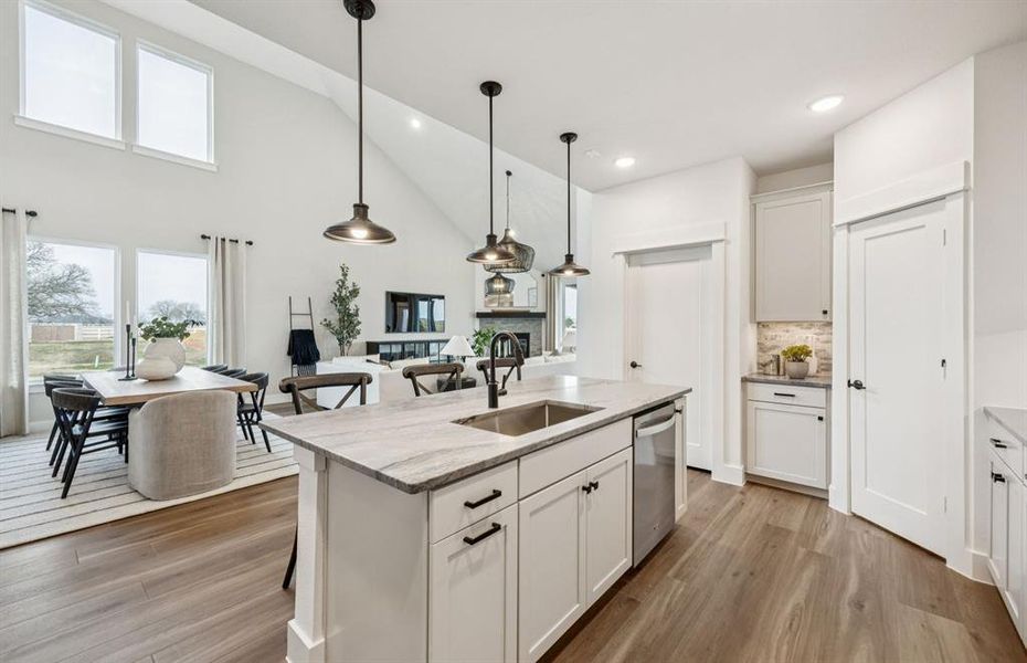 View of main living areas from kitchen *model representation