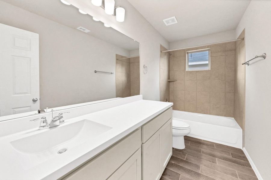 Furnished interior view inside a new home in Woodland Lakes, Houston (Image 11).