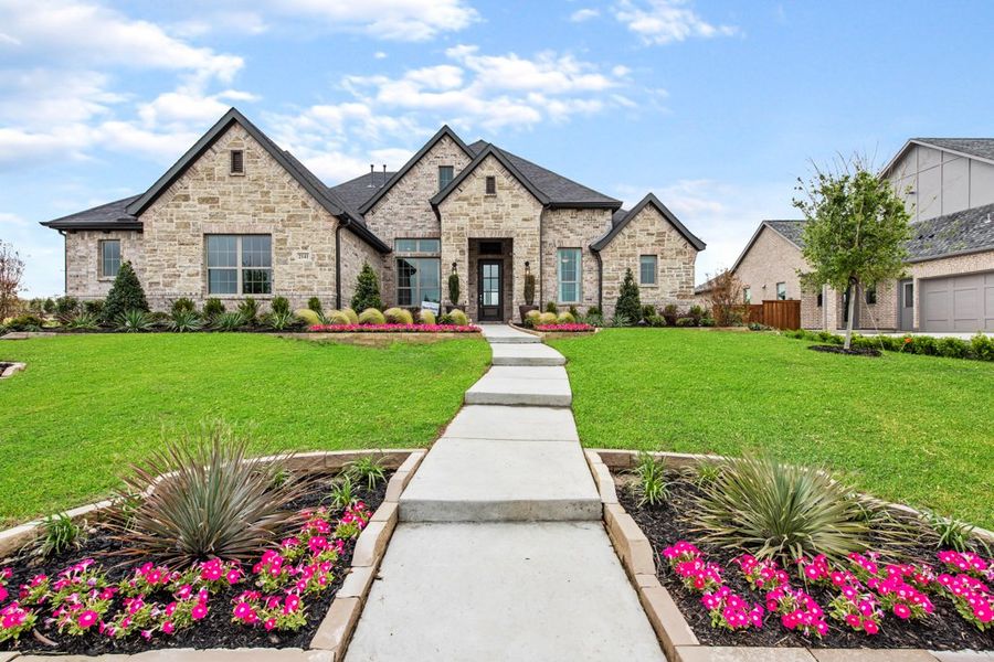 Front exterior of a new home in NorthGlen, Haslet, TX, highlighting curb appeal (Image 2). Front exterior of a new home in NorthGlen, Haslet, TX, highlighting curb appeal (Image 2).