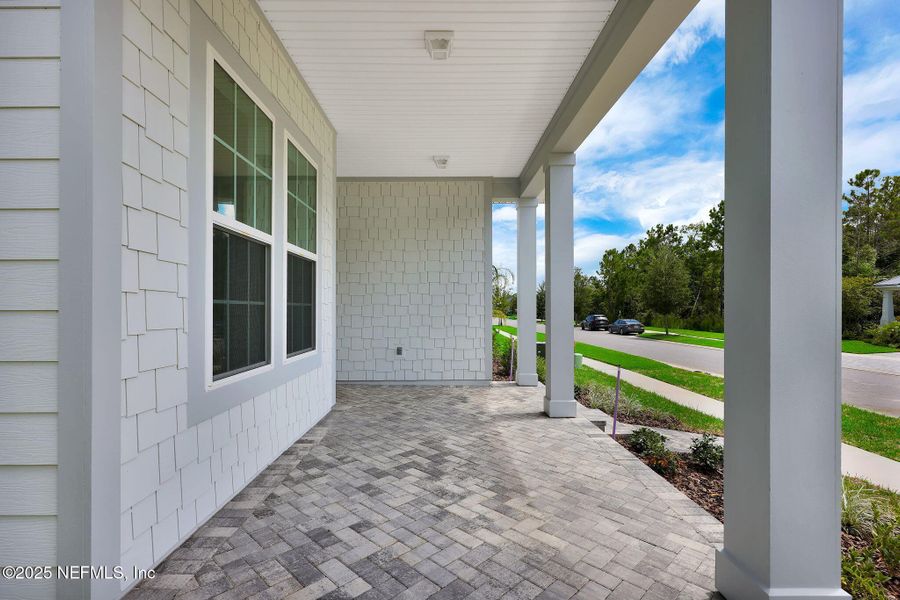 Front exterior of a new home in Seabrook Village at Seabrook, Ponte Vedra, FL, highlighting curb appeal (Image 23).