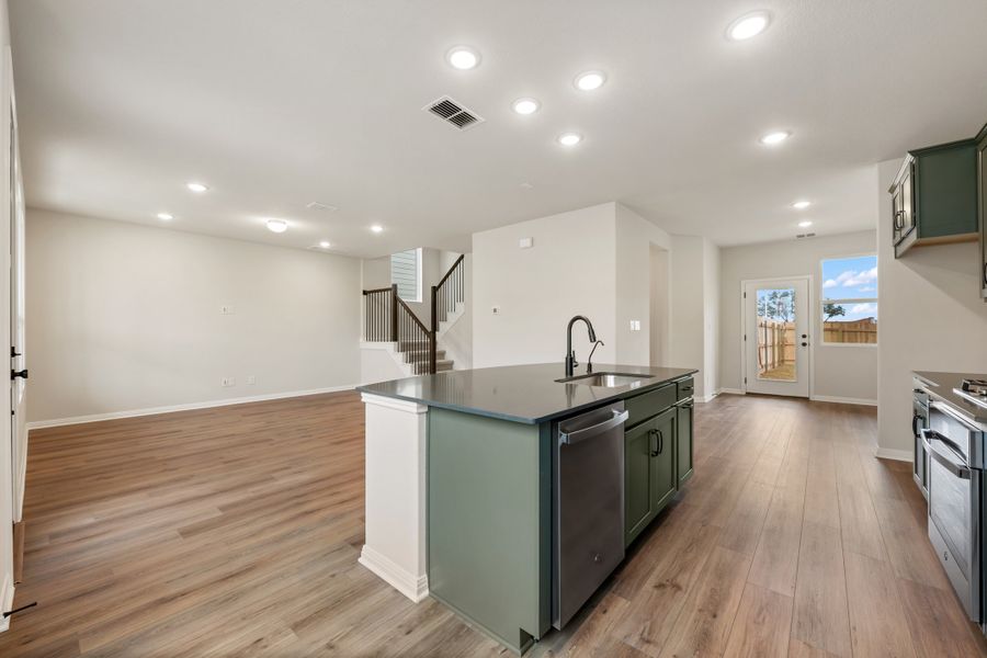 Representative furnished interior of a home built from the Robin by Ashton Woods in The Cottages at Lariat, Liberty Hill (Image 10). Representative furnished interior of a home built from the Robin by Ashton Woods in The Cottages at Lariat, Liberty Hill (Image 10).