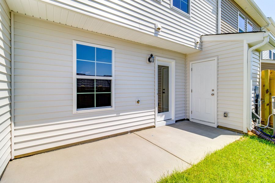 Exterior details and patio area of a home in Astoria, Columbia (Image 3).