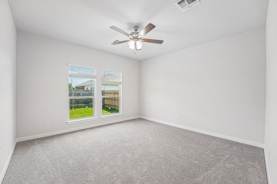 Representative unfurnished interior of a home built from the Warrior by Omega Builders in Grove East, Temple (Image 13).
