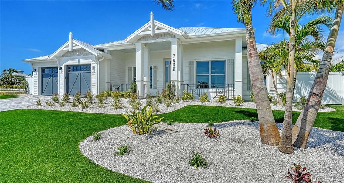 Front exterior of a new home in , Bradenton, FL, highlighting curb appeal (Image 2).
