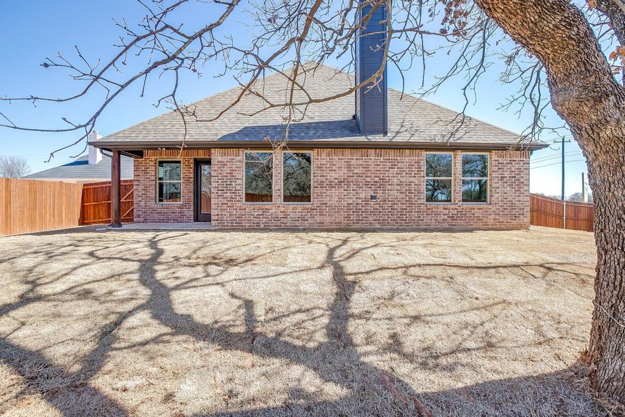 Representative exterior photo of a completed home built from the The Angelina by Trinity Classic Homes in Covenant Springs, Springtown, TX (Image 31).