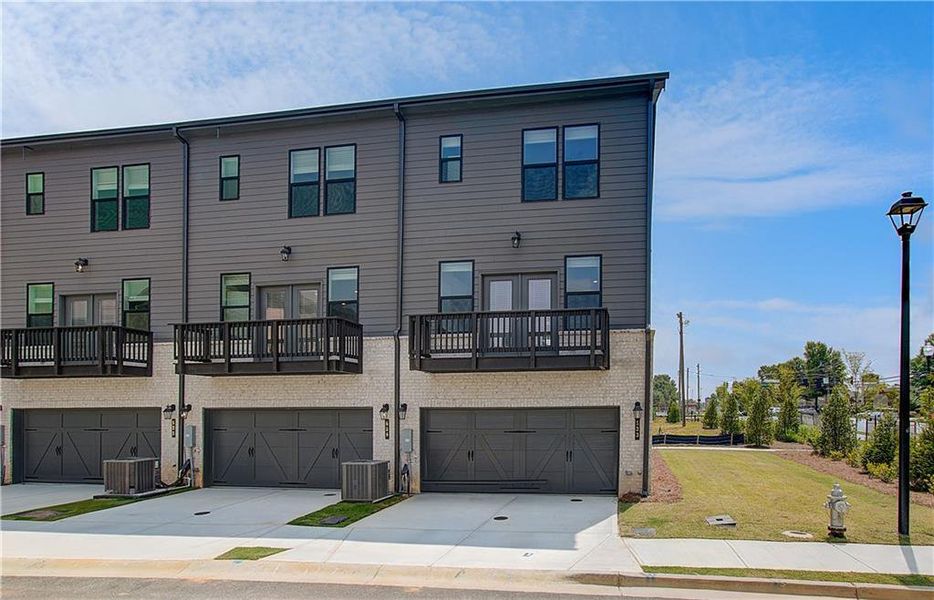 Front exterior of a new home in Silverock, McDonough, GA, highlighting curb appeal (Image 21).
