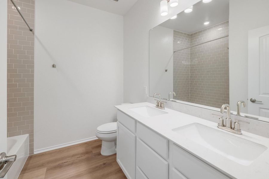 Furnished interior view inside a new home in River Bluff, Leander (Image 7). Furnished interior view inside a new home in River Bluff, Leander (Image 7).