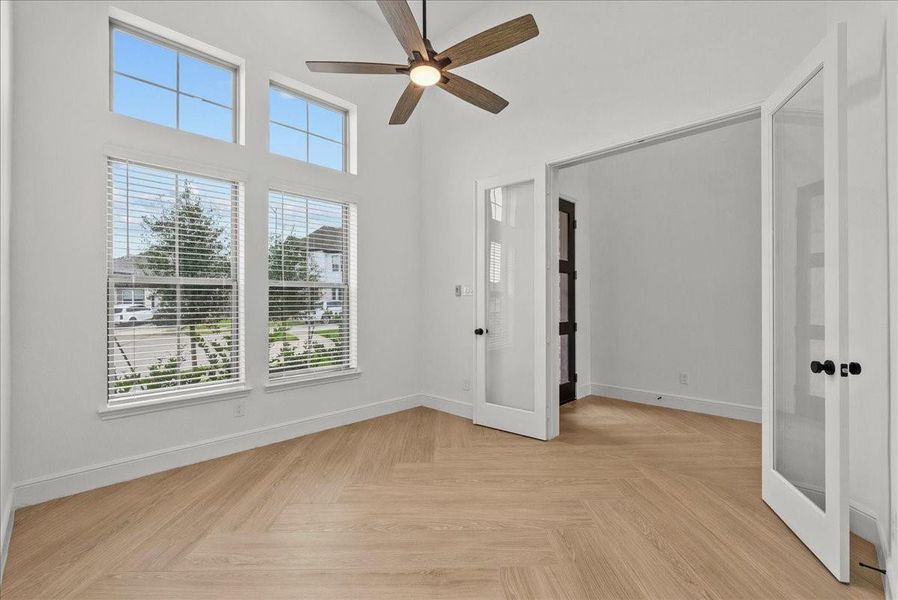 Private home office with French doors.
