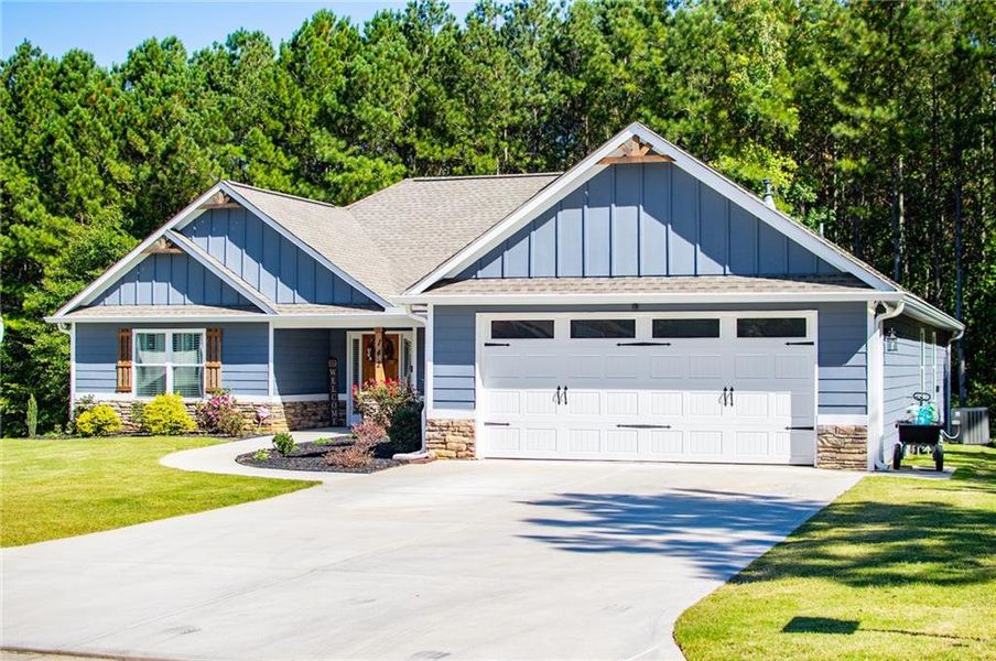 Front exterior of a new home in , Villa Rica, GA, highlighting curb appeal (Image 2). Front exterior of a new home in , Villa Rica, GA, highlighting curb appeal (Image 2).