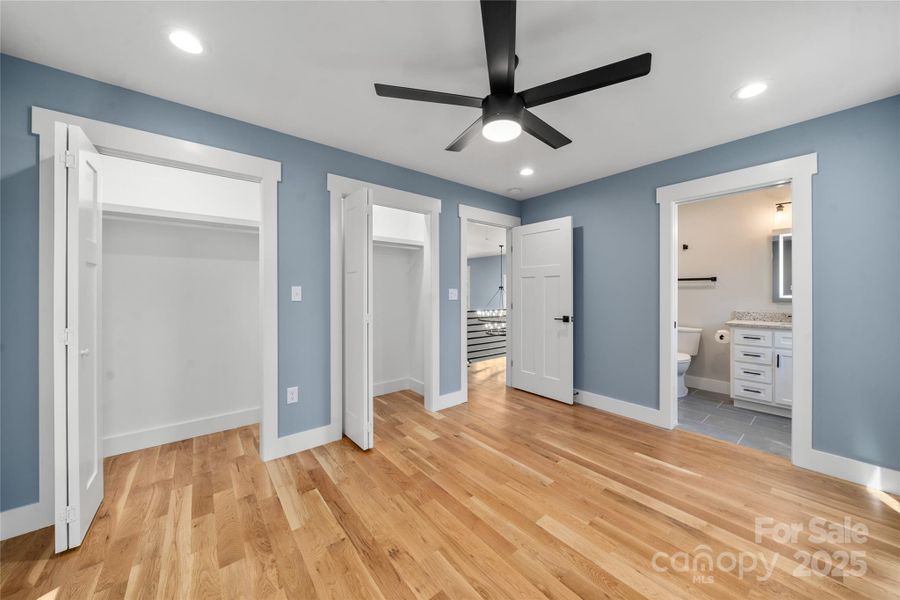 Upper level ensuite bedroom three with huge closets