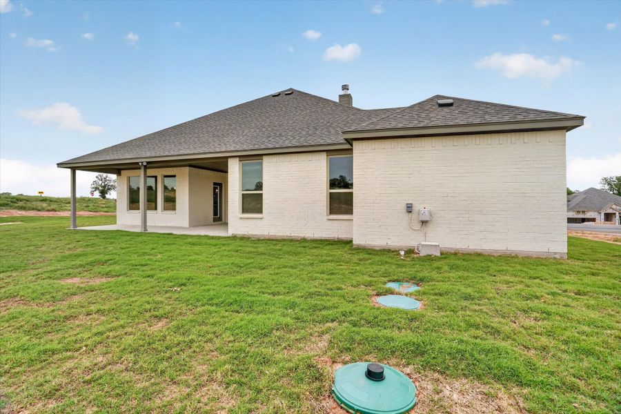 Exterior details and patio area of a home in Terra Vista Estates, Springtown (Image 31).