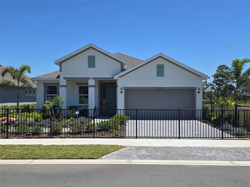Front exterior of a new home in , Venice, FL, highlighting curb appeal (Image 1). Front exterior of a new home in , Venice, FL, highlighting curb appeal (Image 1).
