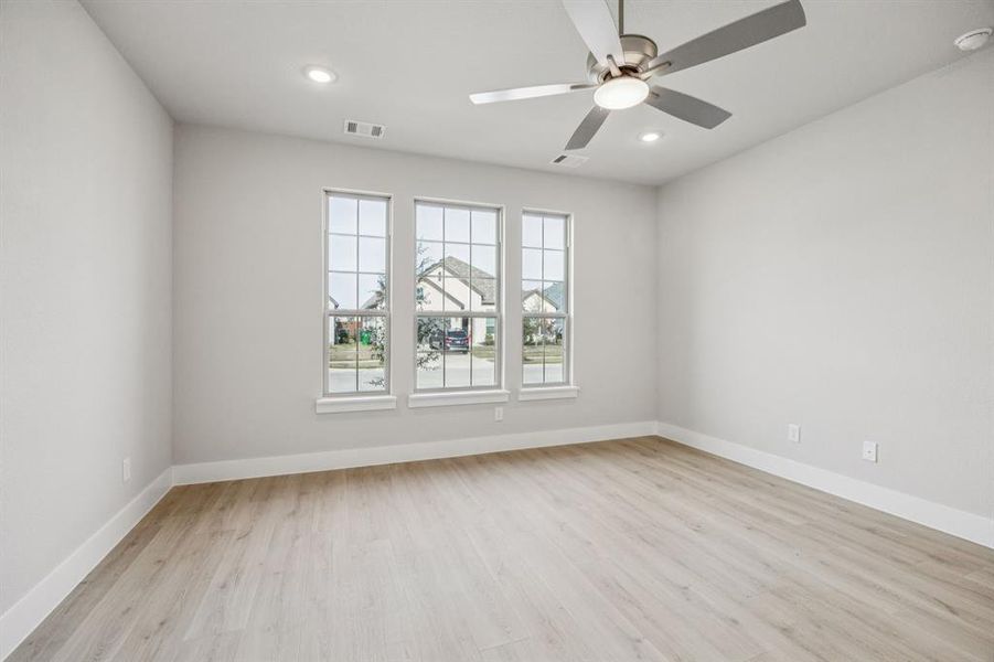 Unfurnished room featuring light wood-style flooring, recessed lighting, and ceiling fan Unfurnished room featuring light wood-style flooring, recessed lighting, and ceiling fan