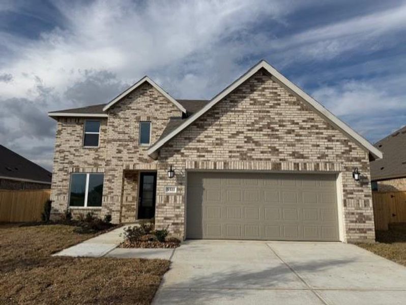 Front exterior of a new home in Scotts Bend, Baytown, TX, highlighting curb appeal (Image 13).