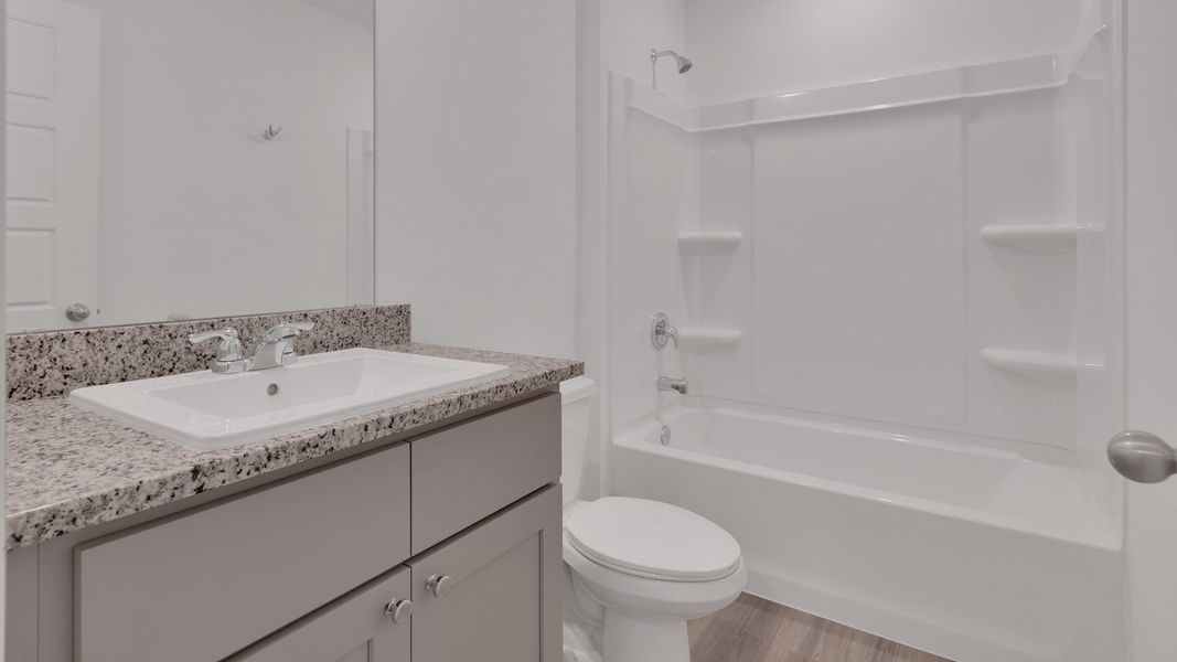 Furnished interior view inside a new home in Allen Farms, Lubbock (Image 6).
