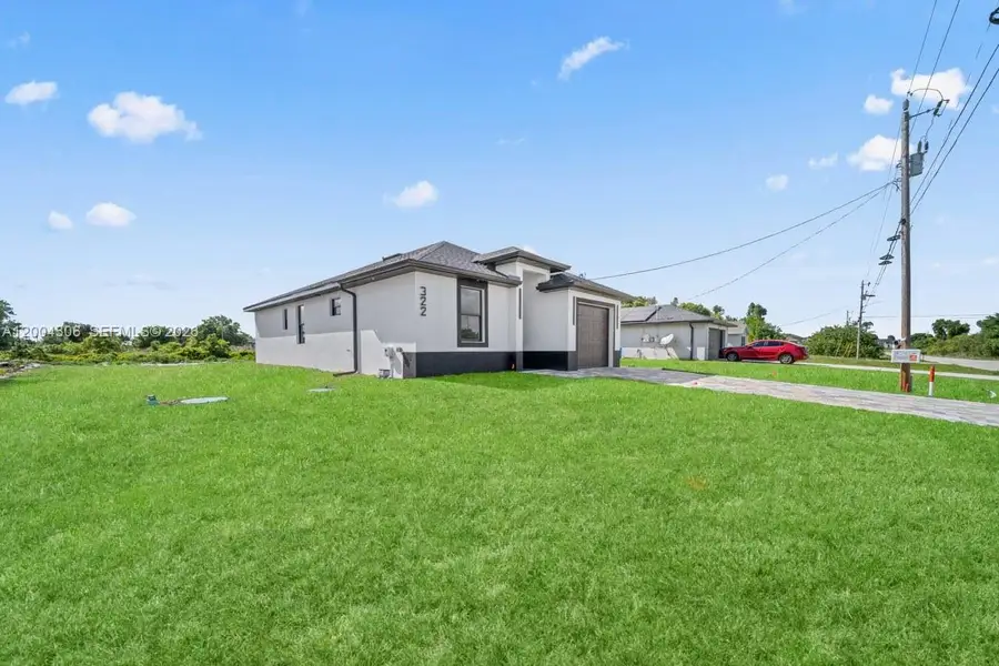 Exterior details and patio area of a home in , Lehigh Acres (Image 3).