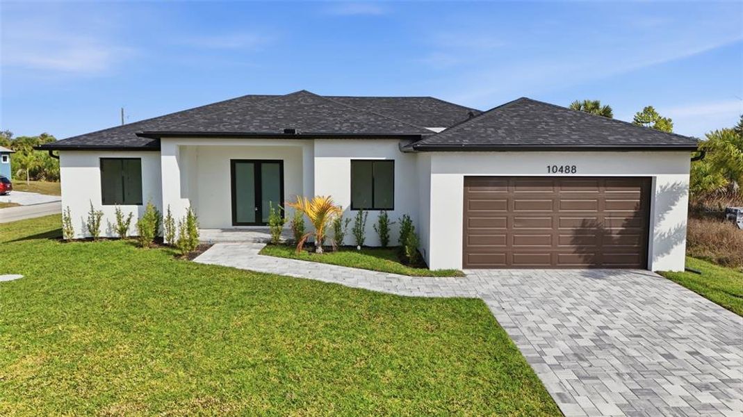 Front exterior of a new home in , Port Charlotte, FL, highlighting curb appeal (Image 19).
