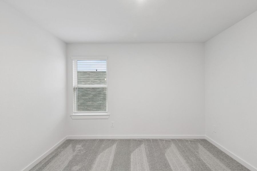 Spacious, unfurnished interior of a new home in Pinewood at Grand Texas, New Caney (Image 15).