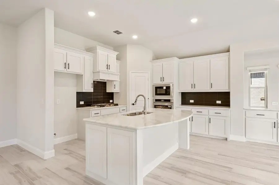 Furnished interior view inside a new home in Devonshire, Forney (Image 7).