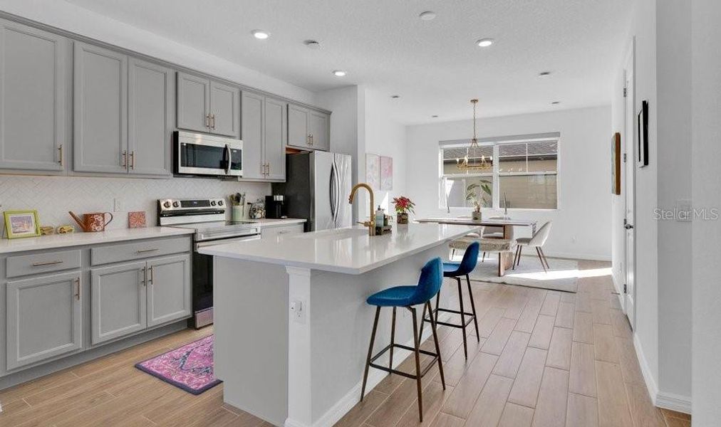Furnished interior view inside a new home in Northlake at Ovation, Winter Garden (Image 10).