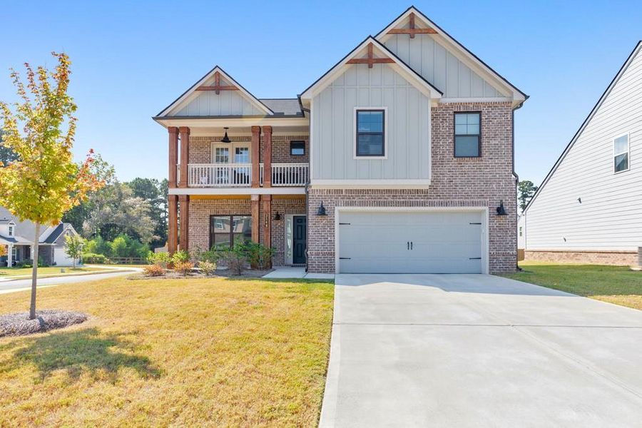 Front exterior of a new home in , Powder Springs, GA, highlighting curb appeal (Image 23).