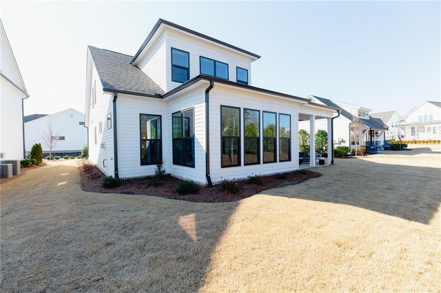 Exterior details and patio area of a home in Aberdeen, Hoschton (Image 3).